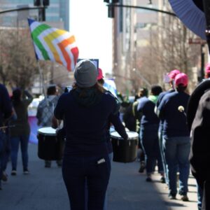 Pep band marching in Downtown Raleigh